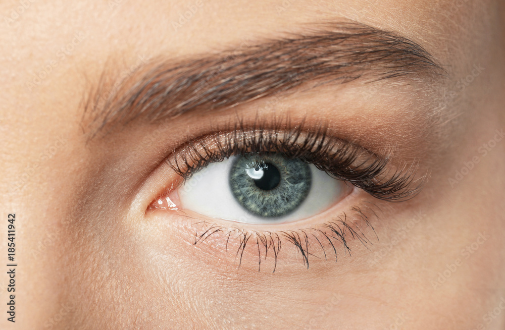 Female eye with long eyelashes, closeup Female eye with long eyelashes, closeup