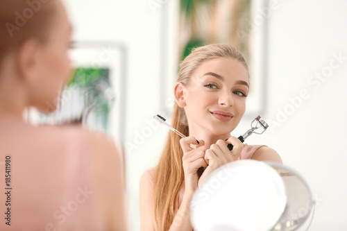 Beautiful young woman with ...