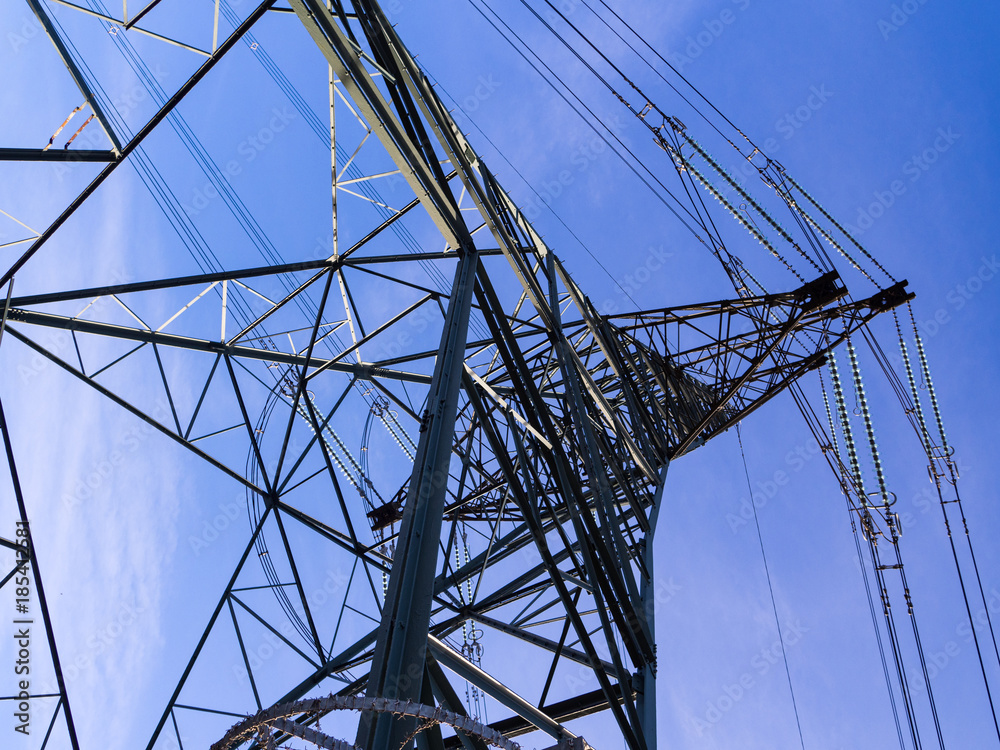 Close Up Pylon from Angle in Sunlight with Blue Sky Close Up Pylon from Angle in Sunlight with Blue Sky
