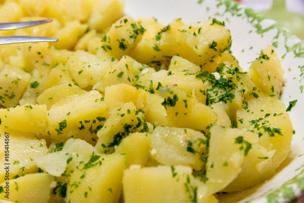 Side dish of boiled potatoes with parsley Side dish of boiled potatoes with parsley