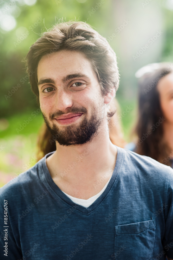 Portrait of a friendly young man wearing a beard Portrait of a friendly young man wearing a beard