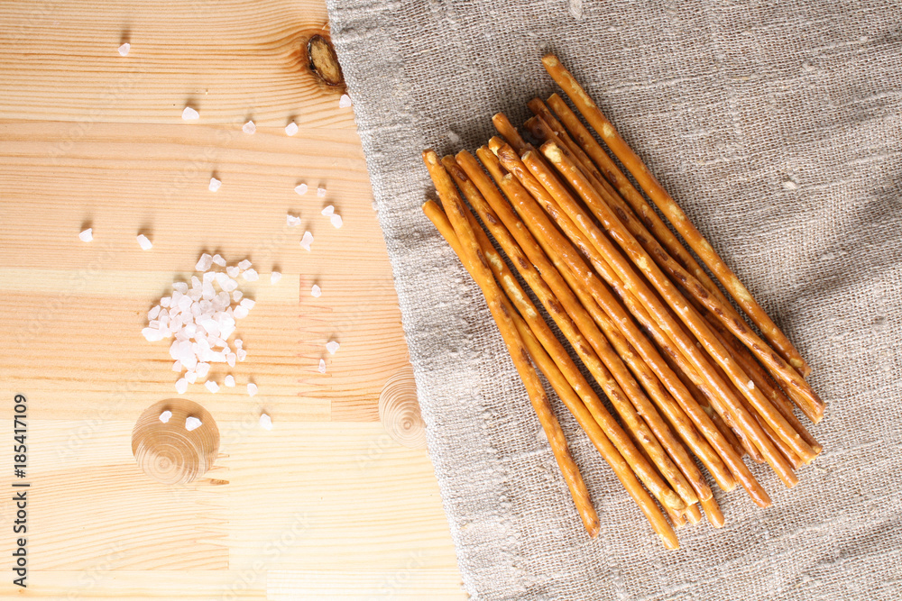 Obraz premium sticks bread salted on a wooden