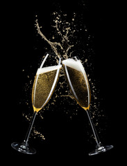 two glasses of champagne isolated on black background
