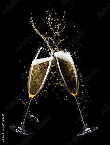 two glasses of champagne isolated on black background