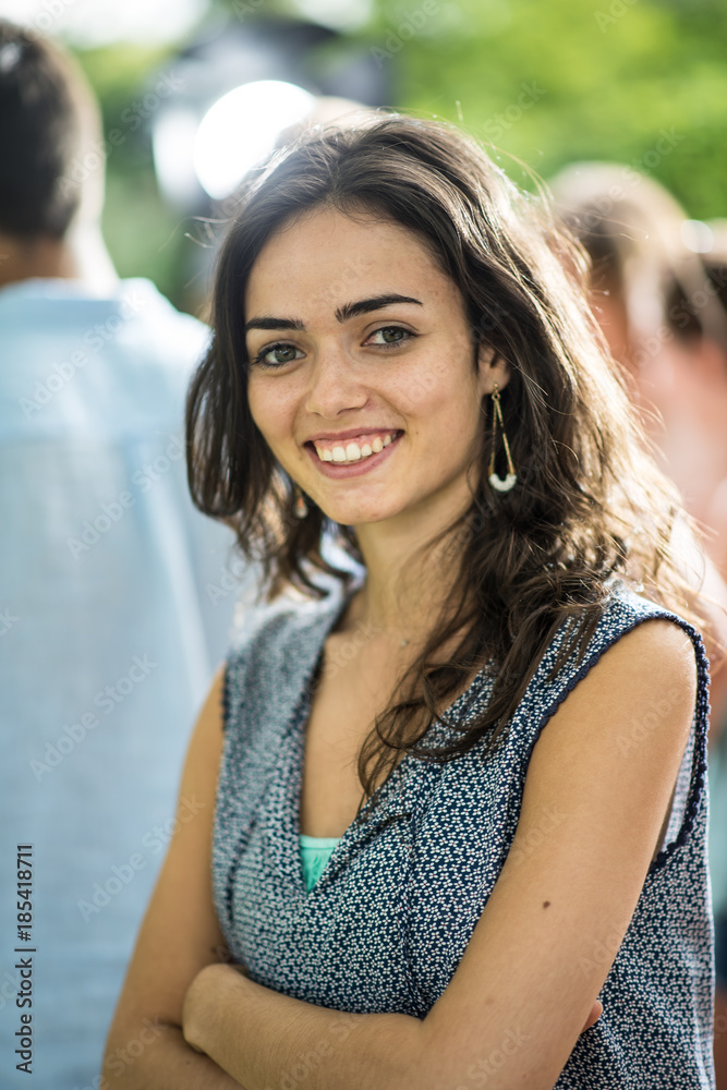 During a party outside, Portrait of a young beautiful woman