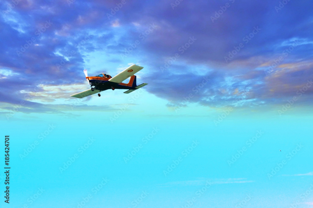 Airplane flying between stormy clouds Airplane flying between stormy clouds