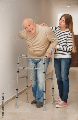 Young woman and her elderly...