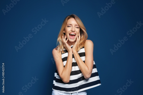 Smiling woman in striped to...