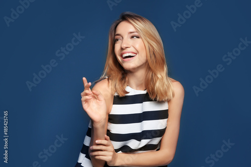 Smiling woman in striped to...