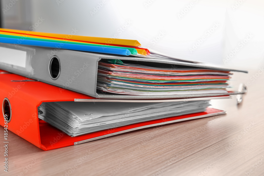 Stack of documents on table Stack of documents on table
