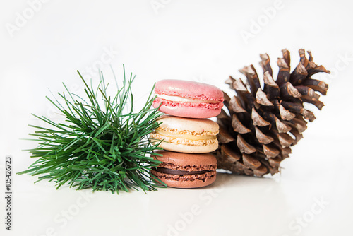 Macarons with cone and spruce branch
