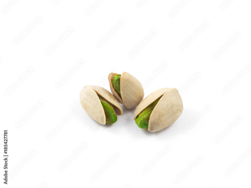Roasted and salted pistachios isolated on white backround Roasted and salted pistachios isolated on white backround