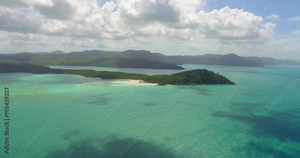 WHITSUNDAY ISLANDS – FEBRUARY 2016 : Aerial shot over Whitehaven Beach on a beautiful day with amazing landscape in view WHITSUNDAY ISLANDS – FEBRUARY 2016 : Aerial shot over Whitehaven Beach on a beautiful day with amazing landscape in view