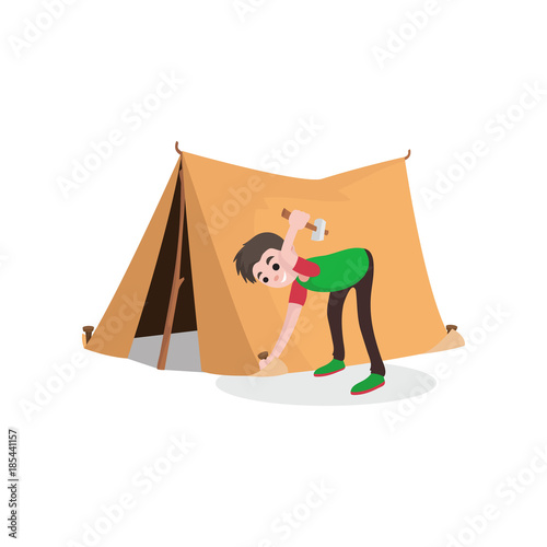 Young smiling teenager boy setting up tourist tent. Summer travel, camping or hiking concept. Flat style cartoon character. Vector illustration