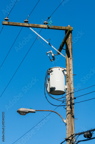telegraph pole with blue sky