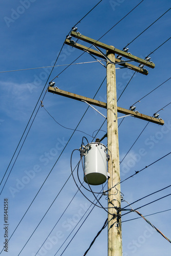 telegraph pole with blue sky