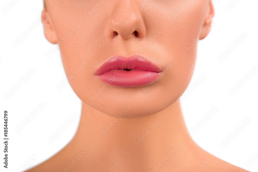Beautiful Perfect Lips. Sexy Mouth close up. Beauty young woman Lips. Close up over white background