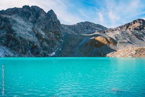 Beautiful blue water in alpine lake. Travels in the mountains