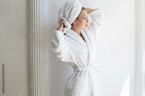  Beautiful young healthy woman relaxing in a robe, picture of beautiful woman beautiful woman in spa salon photo