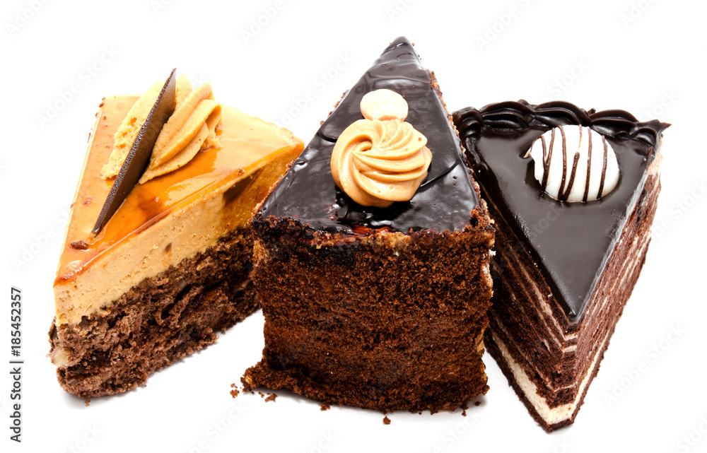 Delicious chocolate cakes pastry with peanut and cream isolated Delicious chocolate cakes pastry with peanut and cream isolated