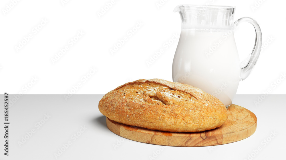 Bread and milk on the table Bread and milk on the table
