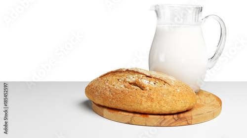 Bread and milk on the table