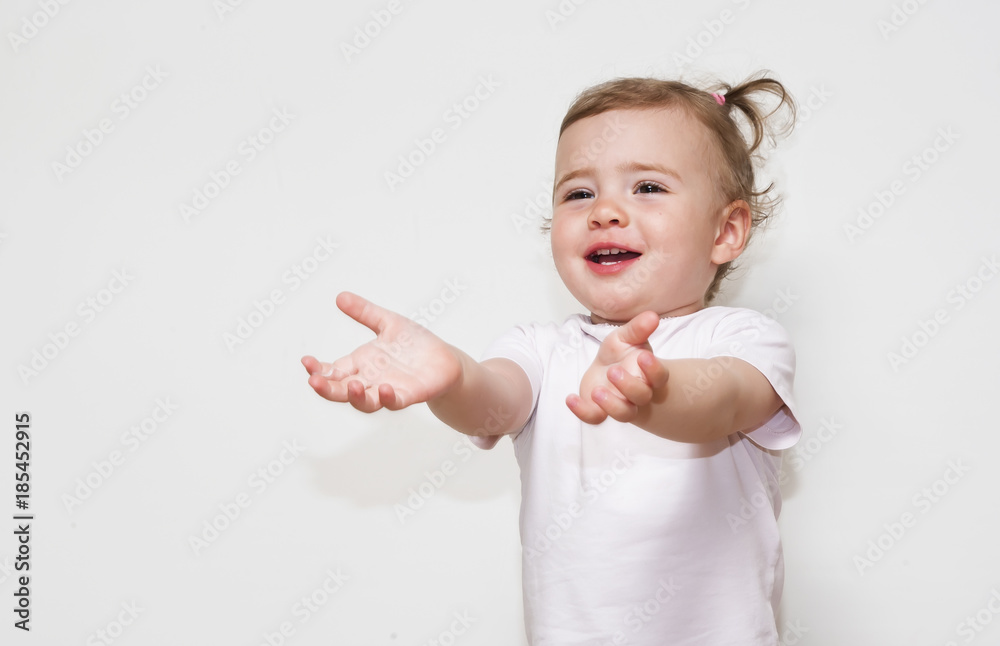 Adorable baby girl laughing isolated on white background Adorable baby girl laughing isolated on white background