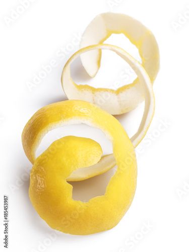 Lemon peel or lemon twist on white background. Close-up. © volff