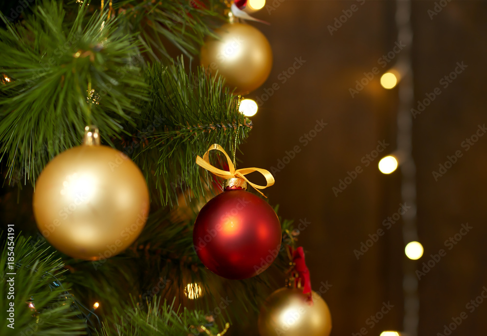 closeup of christmas tree on wooden background, winter holiday concept