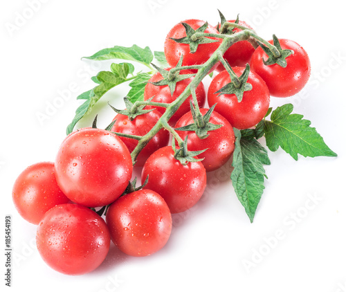 Branch of cherry tomatoes on the white background.