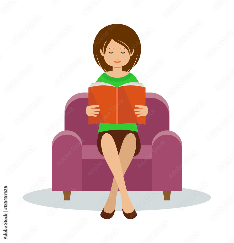 Young woman reads sitting in a chair Young woman reads sitting in a chair