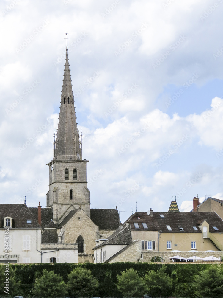 Meursault, Burgundy, France -view of the bell-tower in Meursault in the Cote d Or department in Burgundy in eastern France Meursault, Burgundy, France -view of the bell-tower in Meursault in the Cote d Or department in Burgundy in eastern France