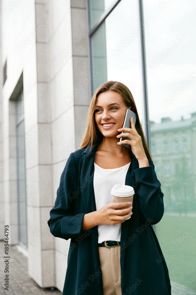 Happy Woman Calling On Phone Standing On Street