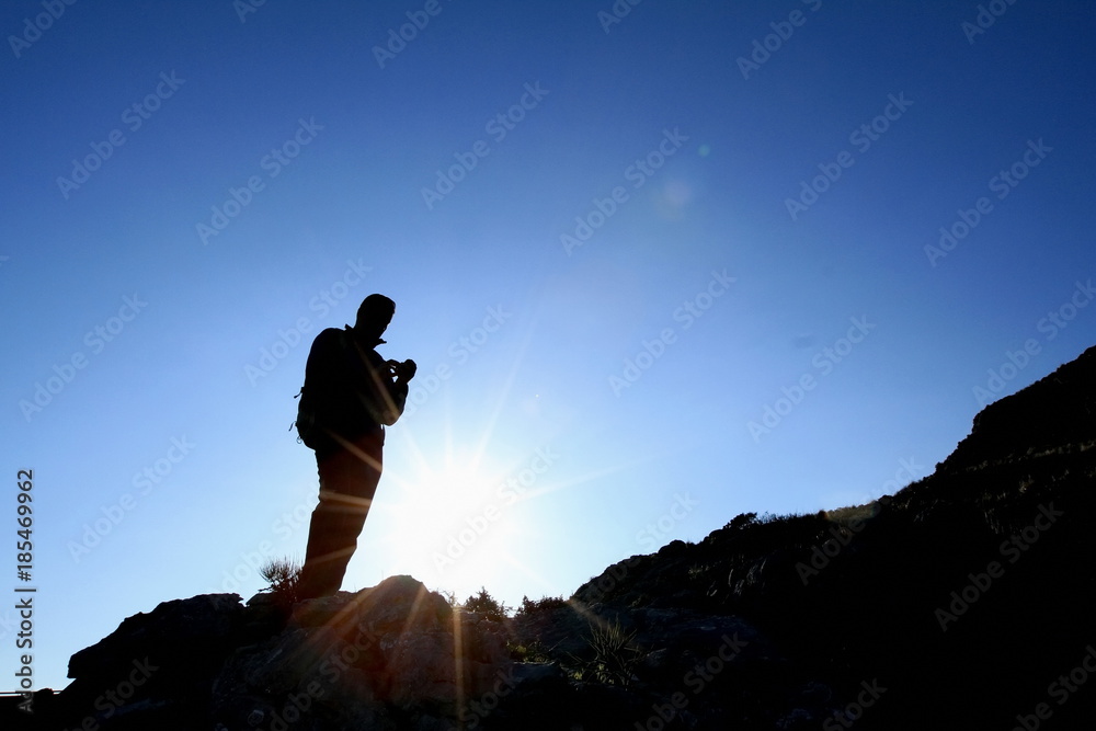 man hill sunset smartphone sun