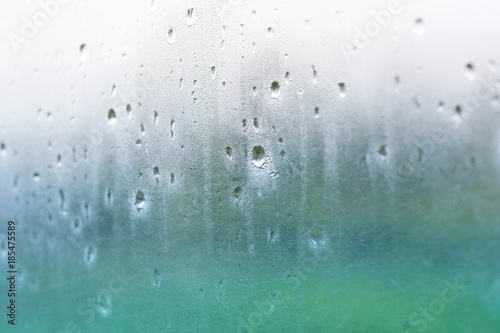 Water drops on misted glass 