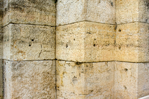 Billede på lærred Ancient stone tiles wall vintage background