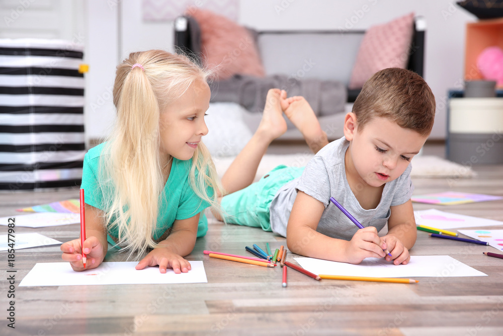 Cute little children drawing at home Cute little children drawing at home