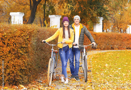 Young couple walking with b...