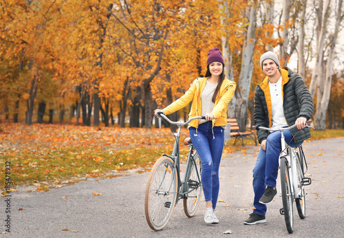 Young couple walking with b...