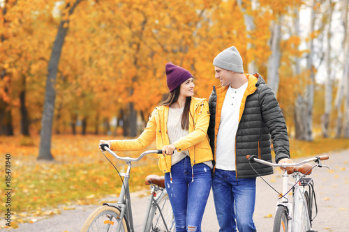 Young couple walking with b...