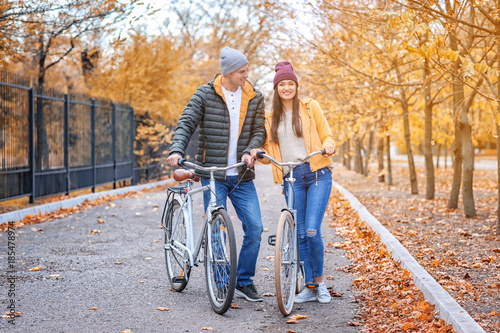 Young couple walking with b...