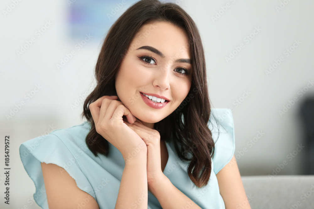 Portrait of young beautiful smiling woman at home Portrait of young beautiful smiling woman at home