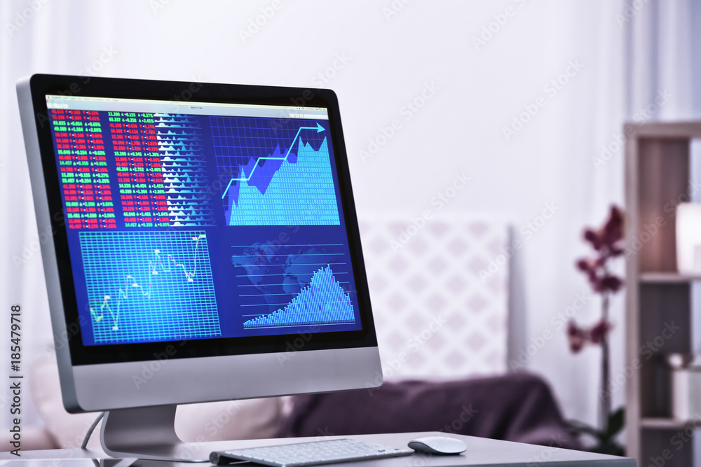 Monitor with stock data on table Monitor with stock data on table