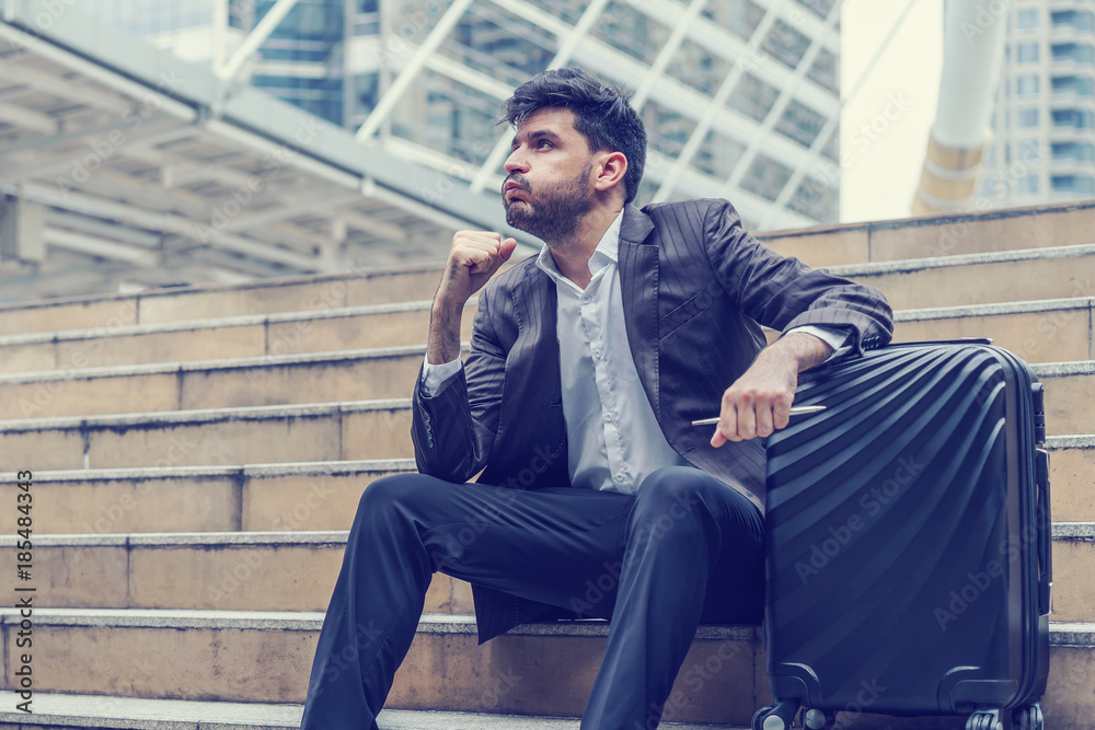 Unemployed businessman stress sitting on stair, concept of business failure and unemployment problem, work life balance. Unemployed businessman stress sitting on stair, concept of business failure and unemployment problem, work life balance.