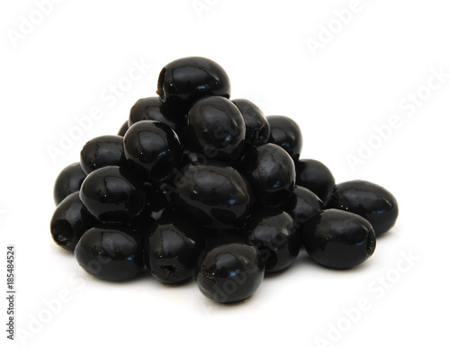 Bunch of black olives on a white background