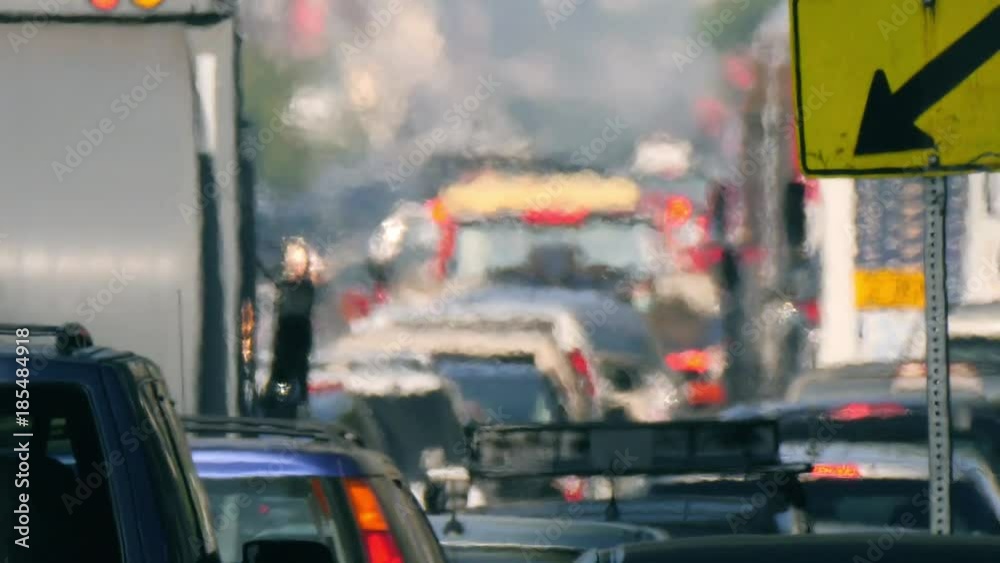 City street crowded cars in traffic jam hot day air turbulence Los Angeles