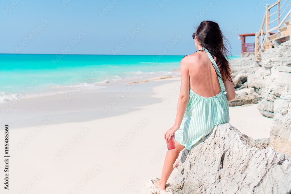 Young woman on a tropical beach
