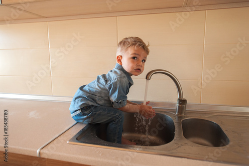 happy child washing hands