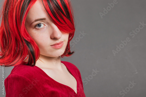 Close-up portrait of Attractive girl with red hair © Yury Kisialiou