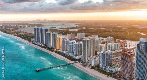 Miami Beach buildings at dusk, aerial view from helicopter © jovannig